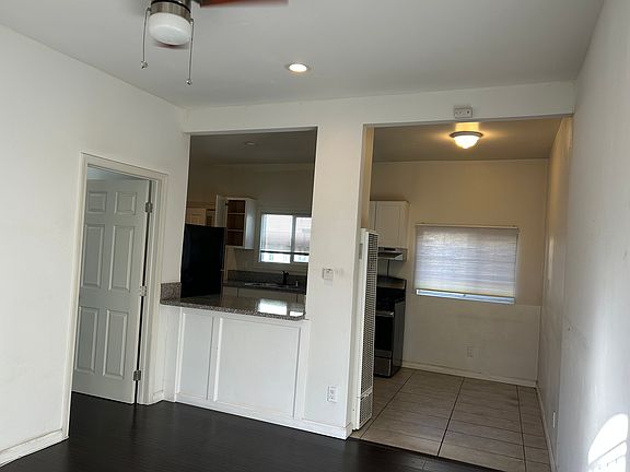 There is a door to the bedroom from the living room