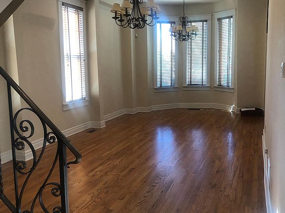 Main floor living/dining room with bay window