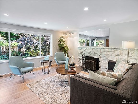 Imagine sitting on the couch enjoying to view of the yard through the large picture window