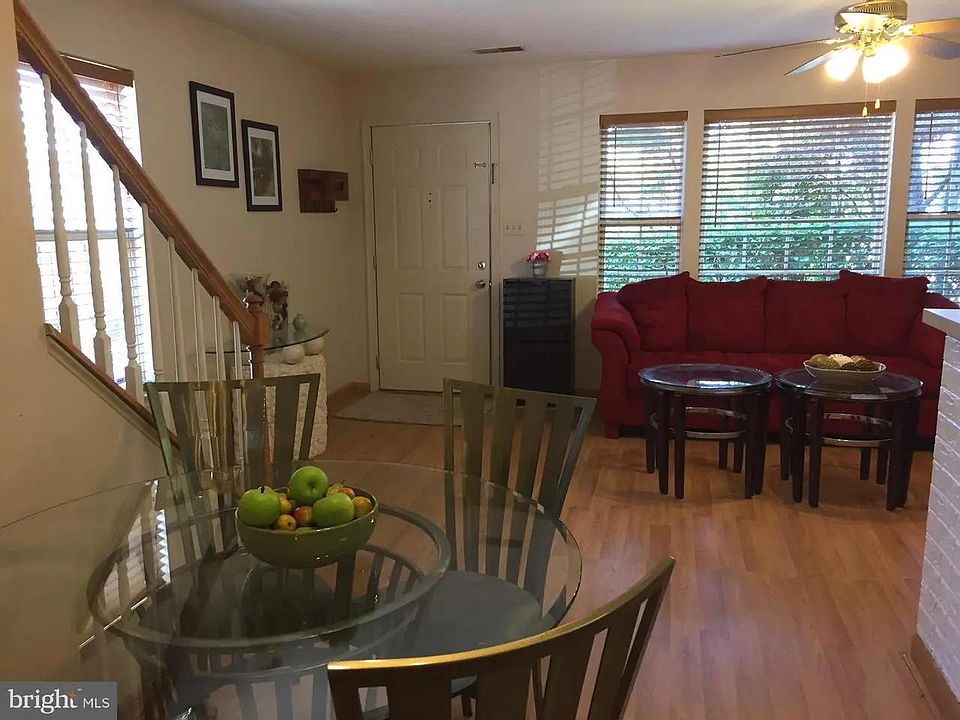 dining area facing front door and stairs to the left