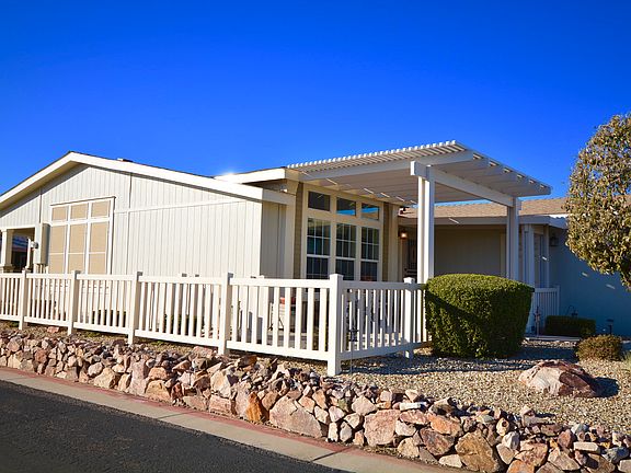 FRONT AND SIDE OF HOME