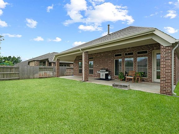 Oversized back porch extends the length of the house!