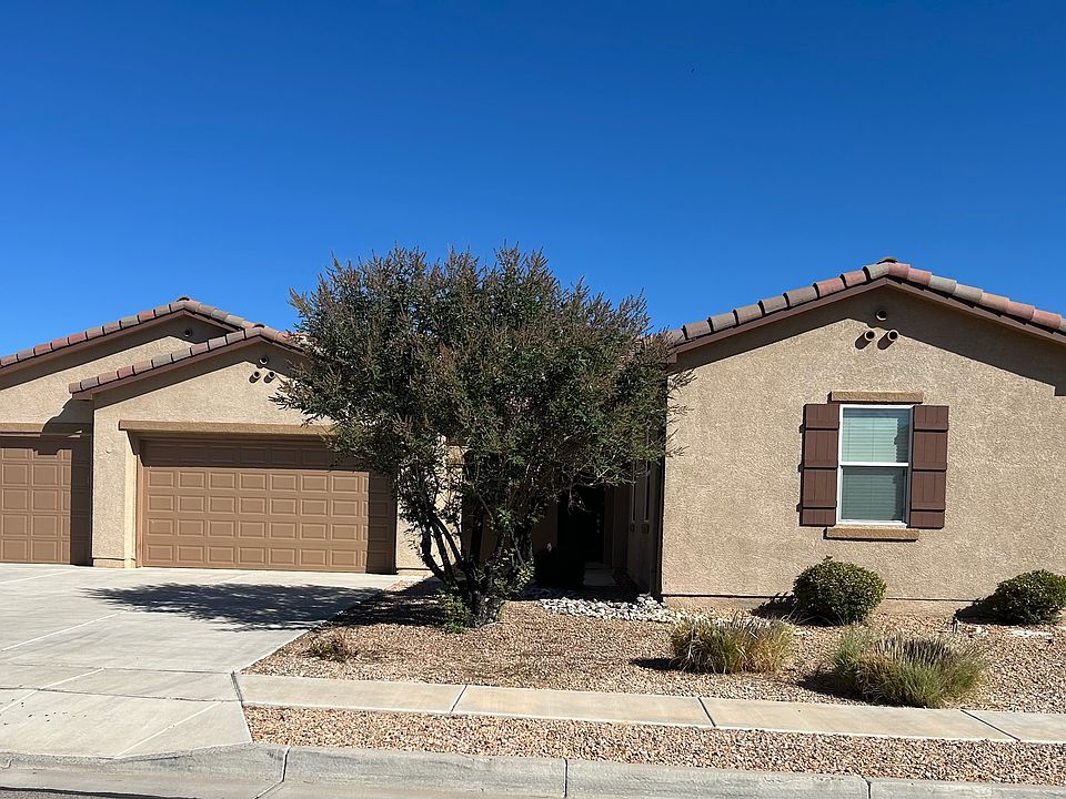 2400 sq ft. Four bedrooms. 2.5 bathrooms
Three car garage is fully insulated. Huge driveway
