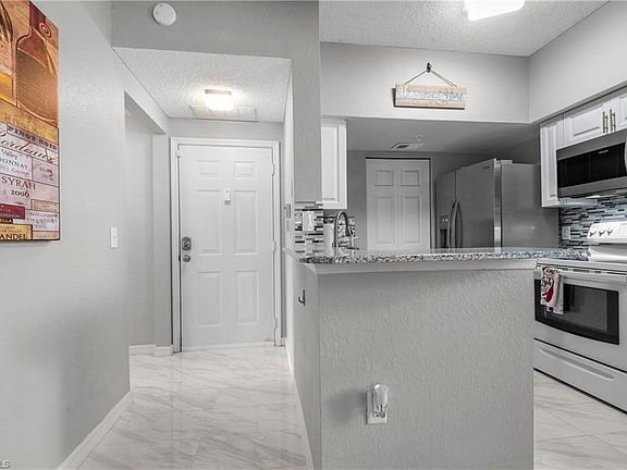 5th image of 15590 Ocean Walk Cir APT 206