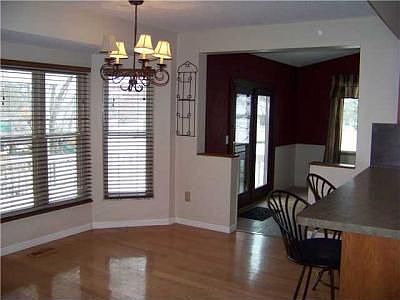 4th image of 9810 Woodsfield Cir N