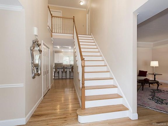 Foyer is open to kitchen, living room and dining room