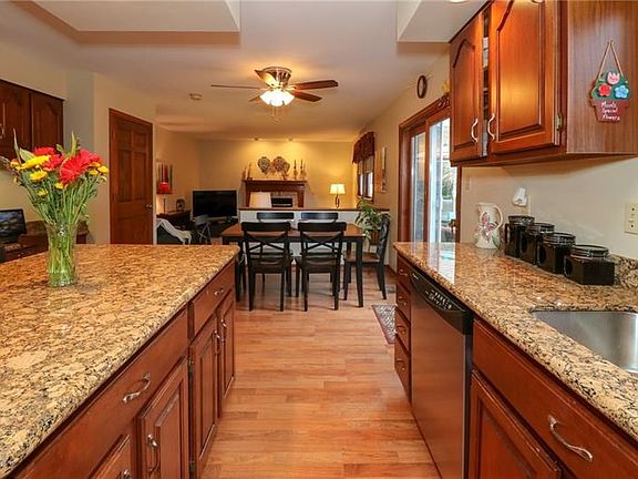 ENJOY YOUR MEALS AT THE KITCHEN TABLE OR WALK RIGHT OUT TO THE DECK FOR A QUIET EVENING OUTDOORS.