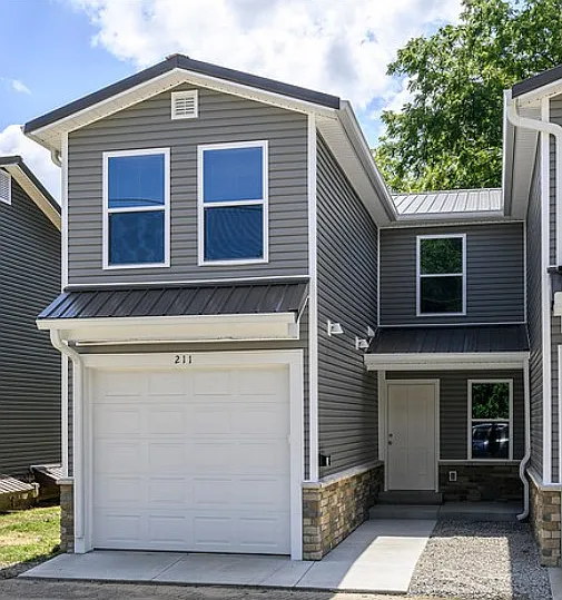 211 Level St! One car insulated garage includes automatic door opener.