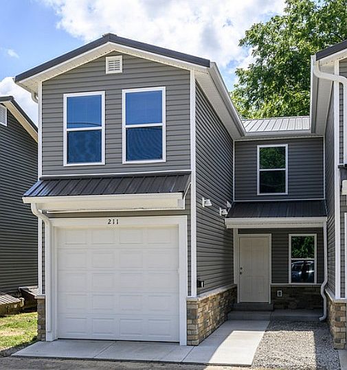 211 Level St! One car insulated garage includes automatic door opener.