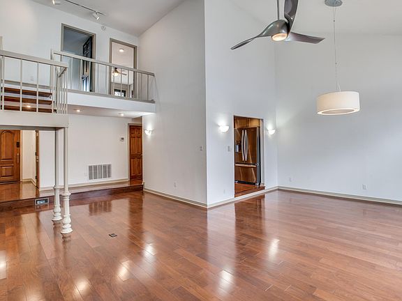 Living & Dining Rooms with 2 Skylights & a Cathedral Ceiling