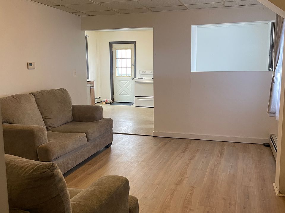 Living room - tenant left behind nice couches. Can remove or offer!