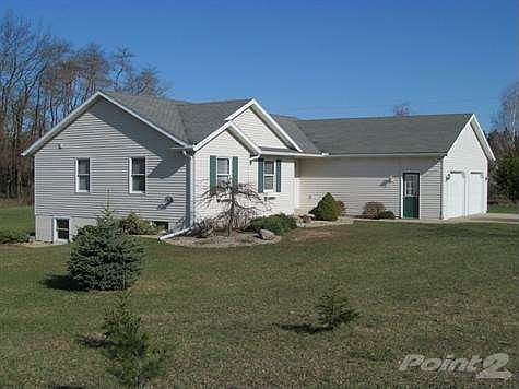 Gorgeous land scaping and spacious home on 1.3 Acres.