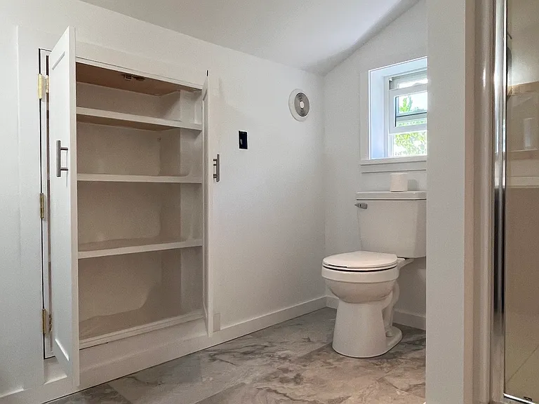 BATHROOM LINEN CLOSET OPEN