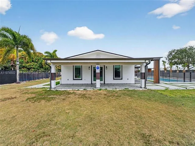 Photo 2 of 20 - 16405 SW 228th St - Miami, FL Building Photo - 16405 SW 228th St