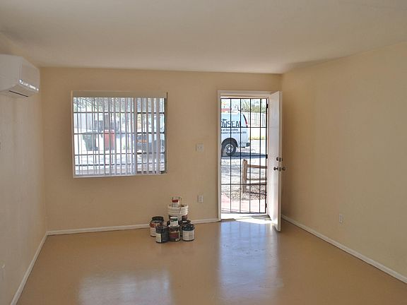 Looking back at the front door entrance. Newer floors.