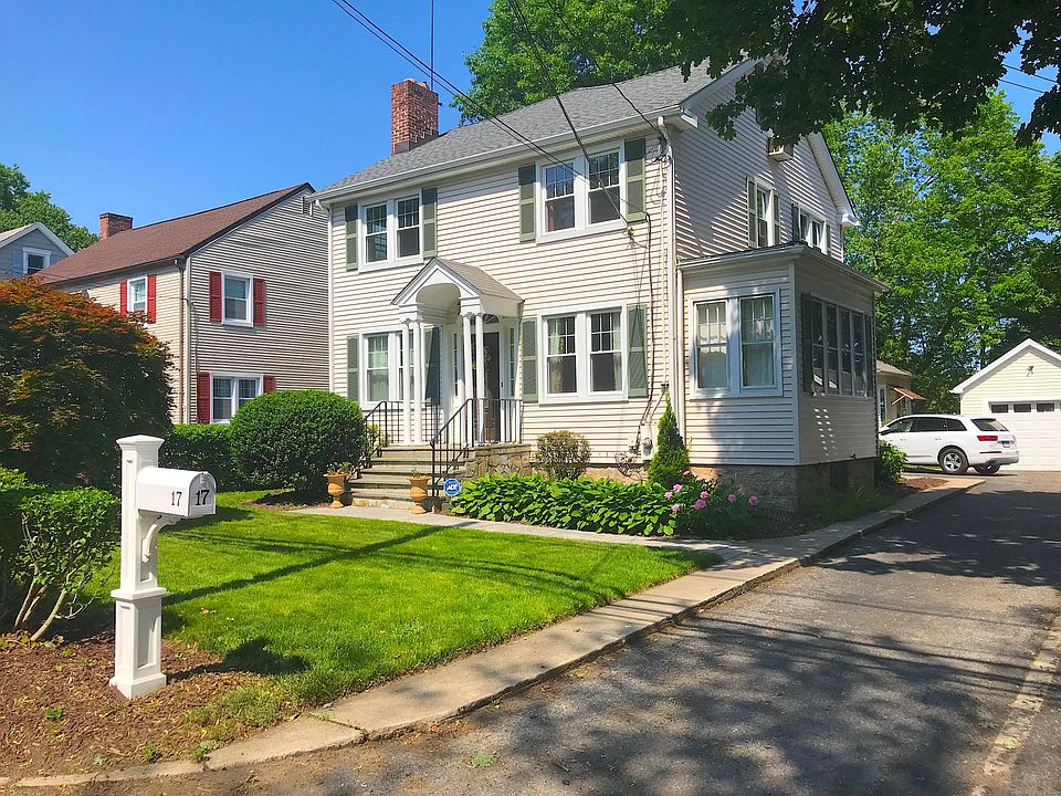 Front entrance with detached garage