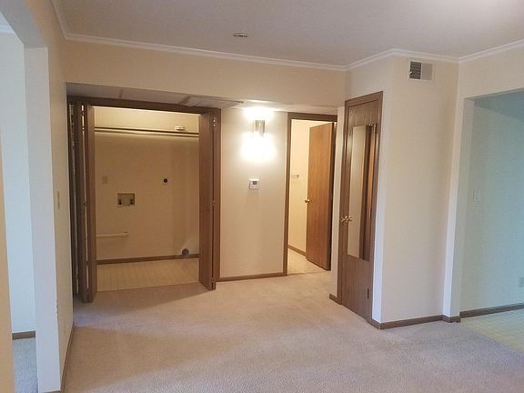 Hallway between bedrooms, family room and kitchen. Washer an