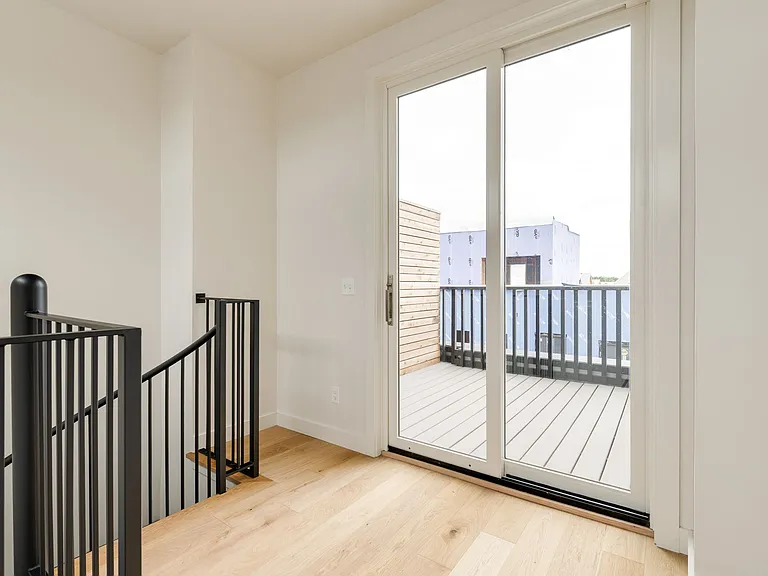 Top of staircase, office/nook, and entry to private outdoor terrace