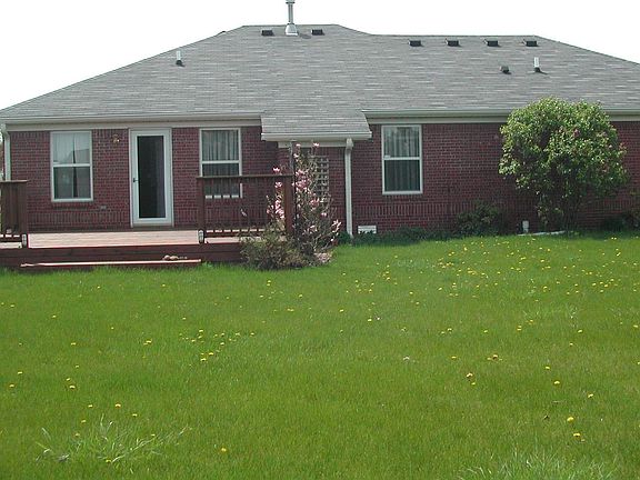 Large back yard with deck