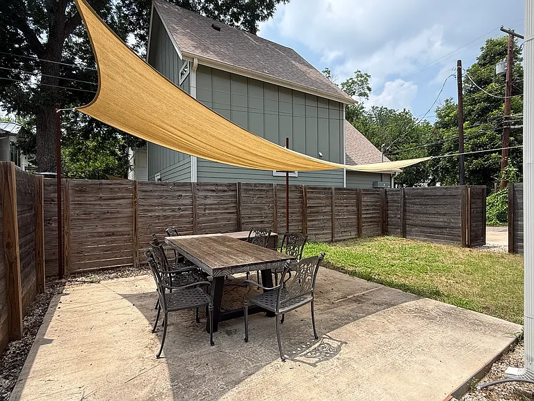 Side yard with covered patio