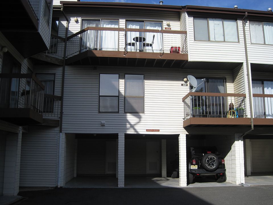 Front of house w/carport