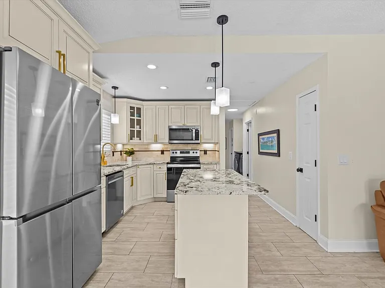 7318 S Kissimmee St — Photo 24