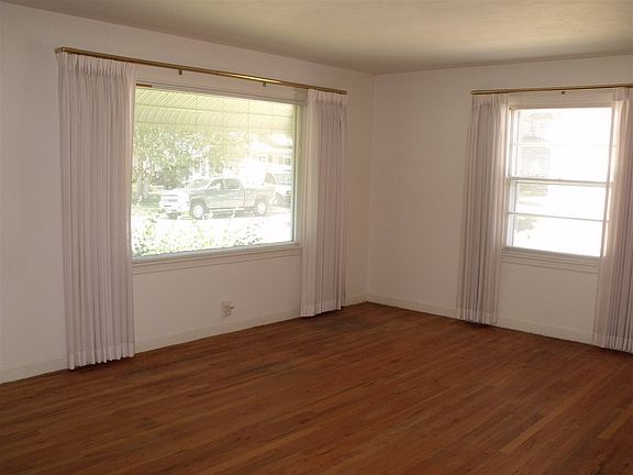 Sunlit Livingroom w/hardwood floors.  13 x 20