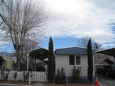 Front w/ carport