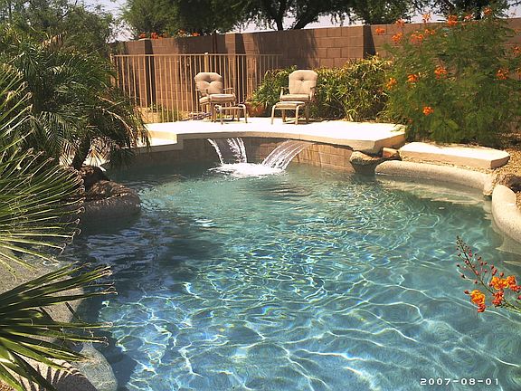 Backyard paradise! Saltwater pool with 2 waterfalls. New cool decking !