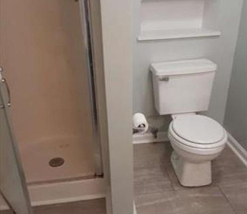 Basement studio suite bathroom and shower.