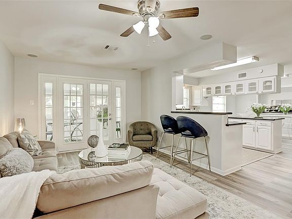 Family room overlooks the kitchen and the sunroom/office/flex room