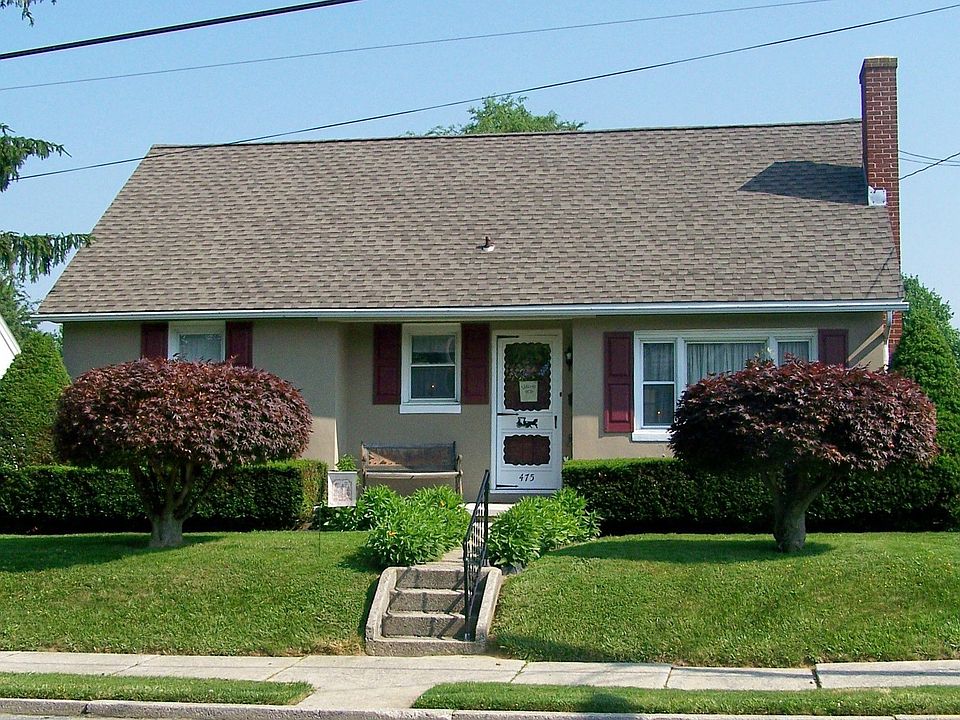 Beautiful Japanese Maple Trees and perennials enhance home's curb appeal