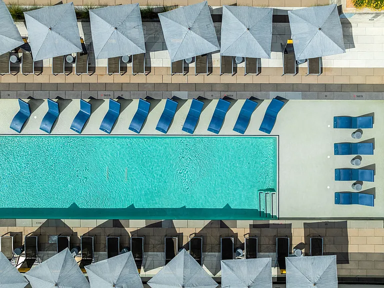 Extensive Shaded Areas and In-Pool Lounge Chairs