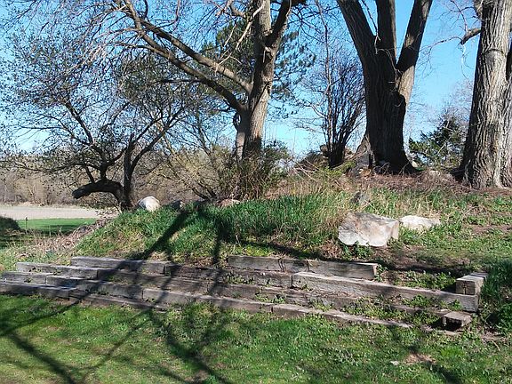 'grassy knoll' behind house
