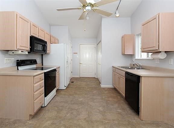 The kitchen is light and bright, and all appliances are included.
