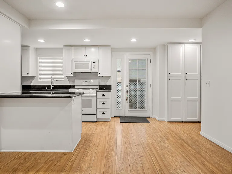 The angle shows one section of the kitchen. To the right and left is the rest of the kitchen.