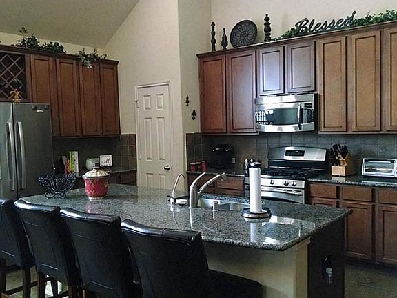 Beautiful Kitchen with large island so the cook can talk to the guests!