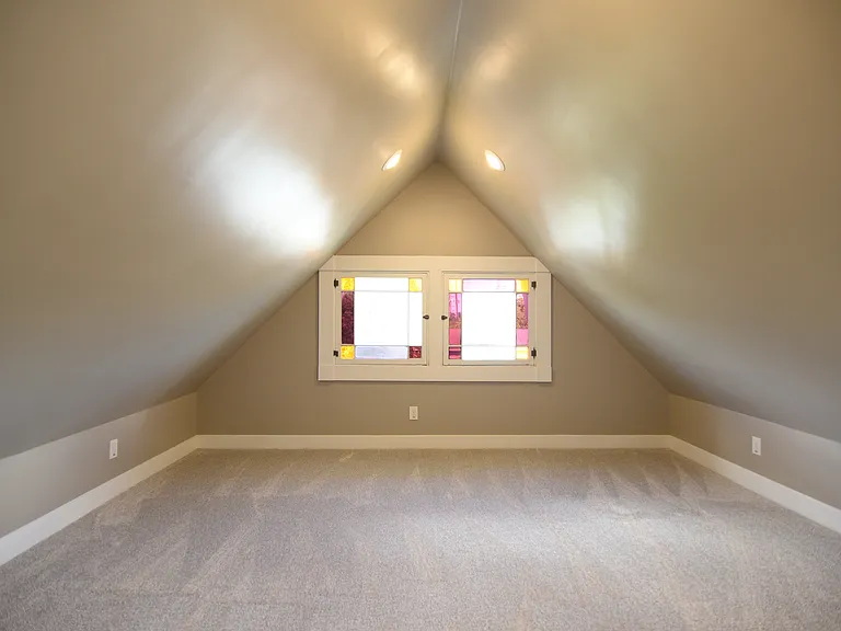Owners paradise with multiple sitting areas. Place your bed where ever you care!! Original stain glass windows, fully restored.