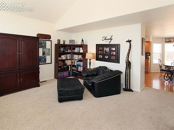 Tranquil living room with dramatic vaulted ceilings