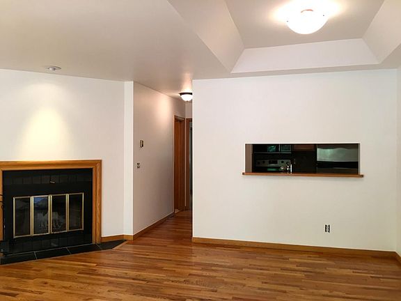 backside of kitchen, hallway to bedroom