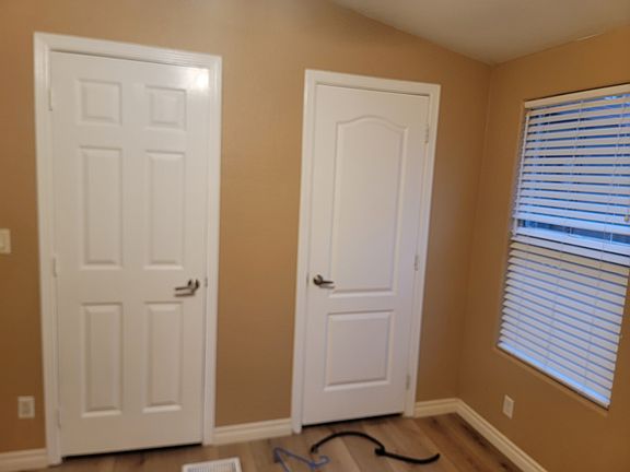 Master bedroom double closet doors.