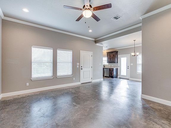 Side view from Living Room to Dining Room and Kitchen