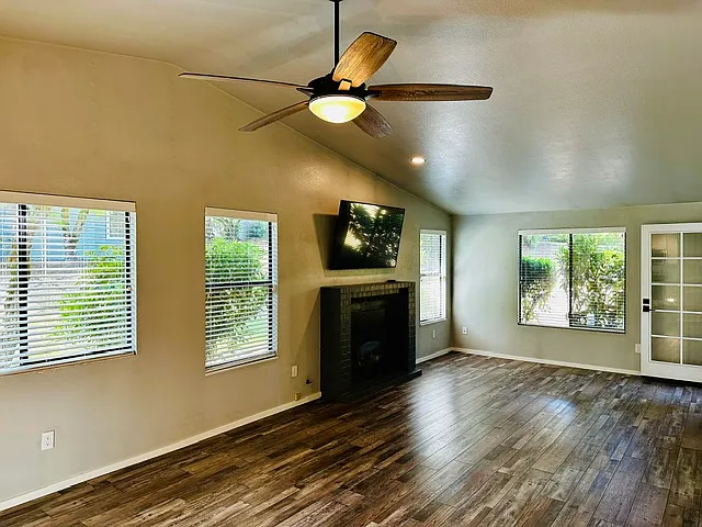 Open Living Room with Gas Masonry Fireplace
