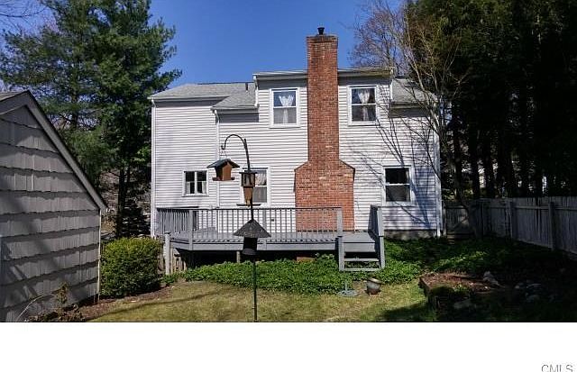Enchanting rear yard to 44 Concord.  A real spacious 4 Bedroom Colonial, meticulously maintained in a truly wonderful friendly neighborhood. Serious perennial plantings helps create a charming private enclave to your backyard.  Note fireplace in Main Leve