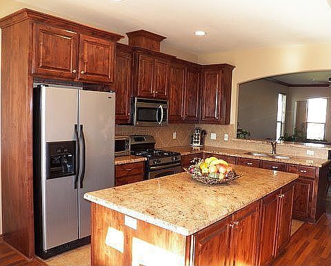 Custom Cabinets & Granite Countertops. Great storage & plenty of counter space