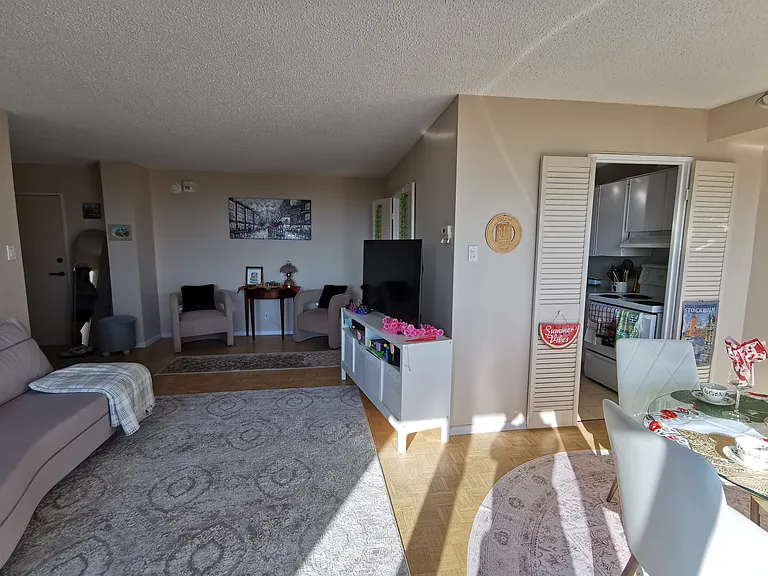 Another look at the living and dining room plus kitchen.