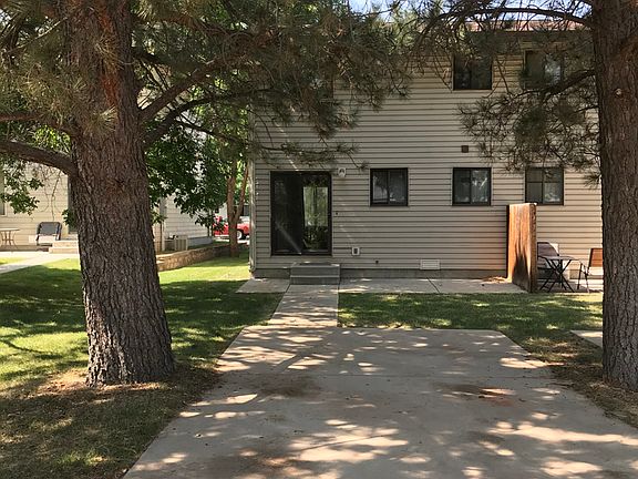 Back yard, parking, mature landscaping