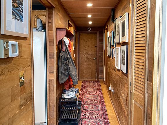 Hallway to bathrooms and bedrooms