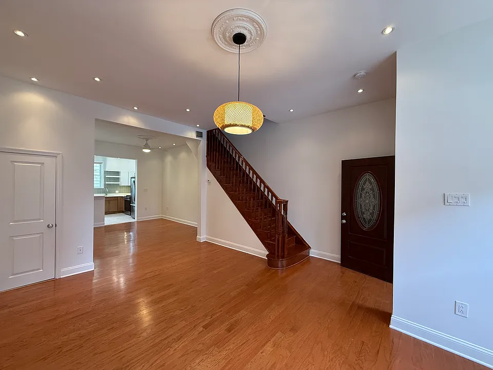 Living Room (door on left is the entrance to the powder room)