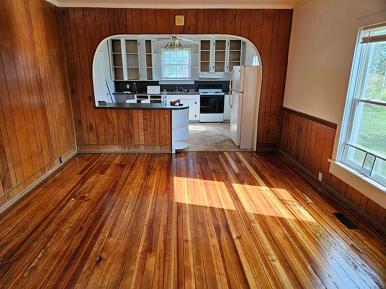 Living Room/Dining Room with Kitchen in background